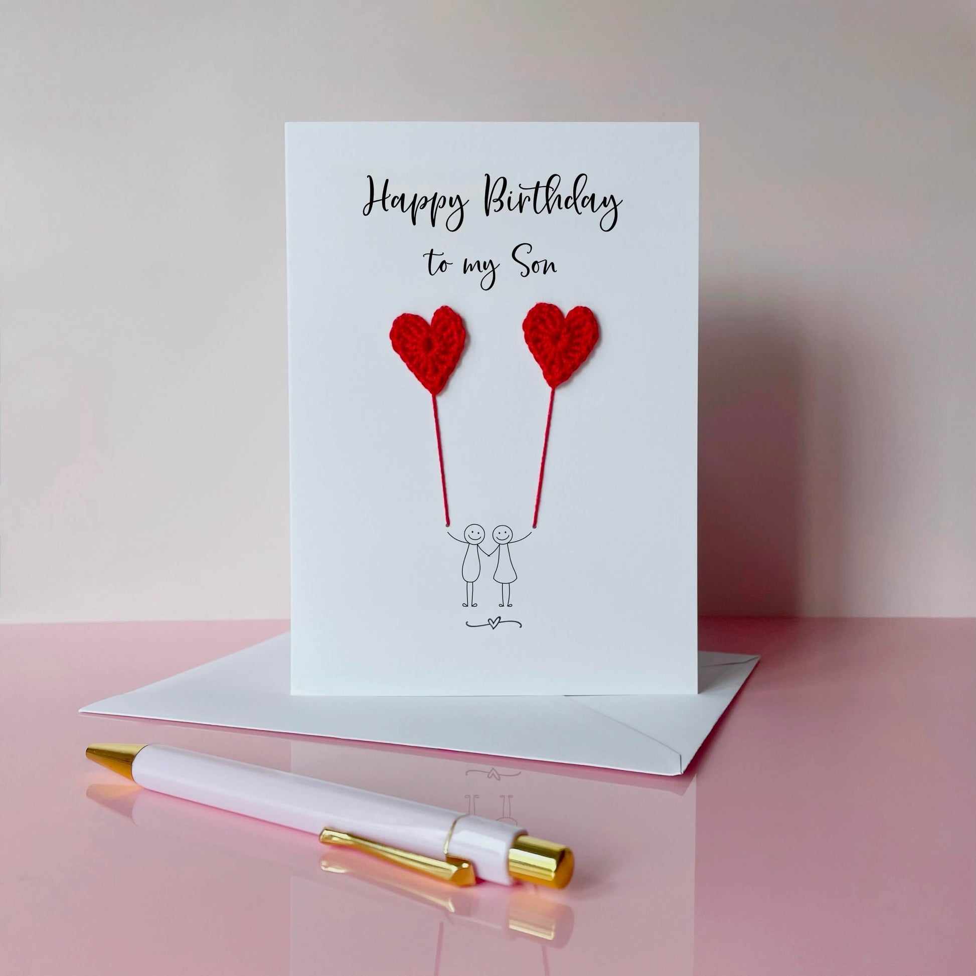 Greeting card with red crochet heart balloons and 'Happy Birthday to my Son' text. 